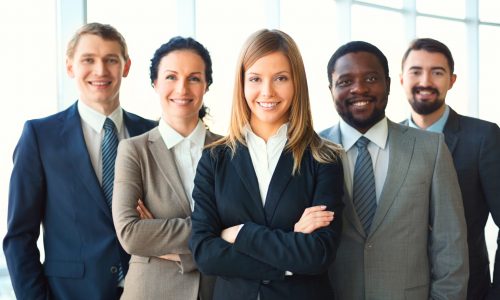 young-businesswoman-with-co-workers-scaled